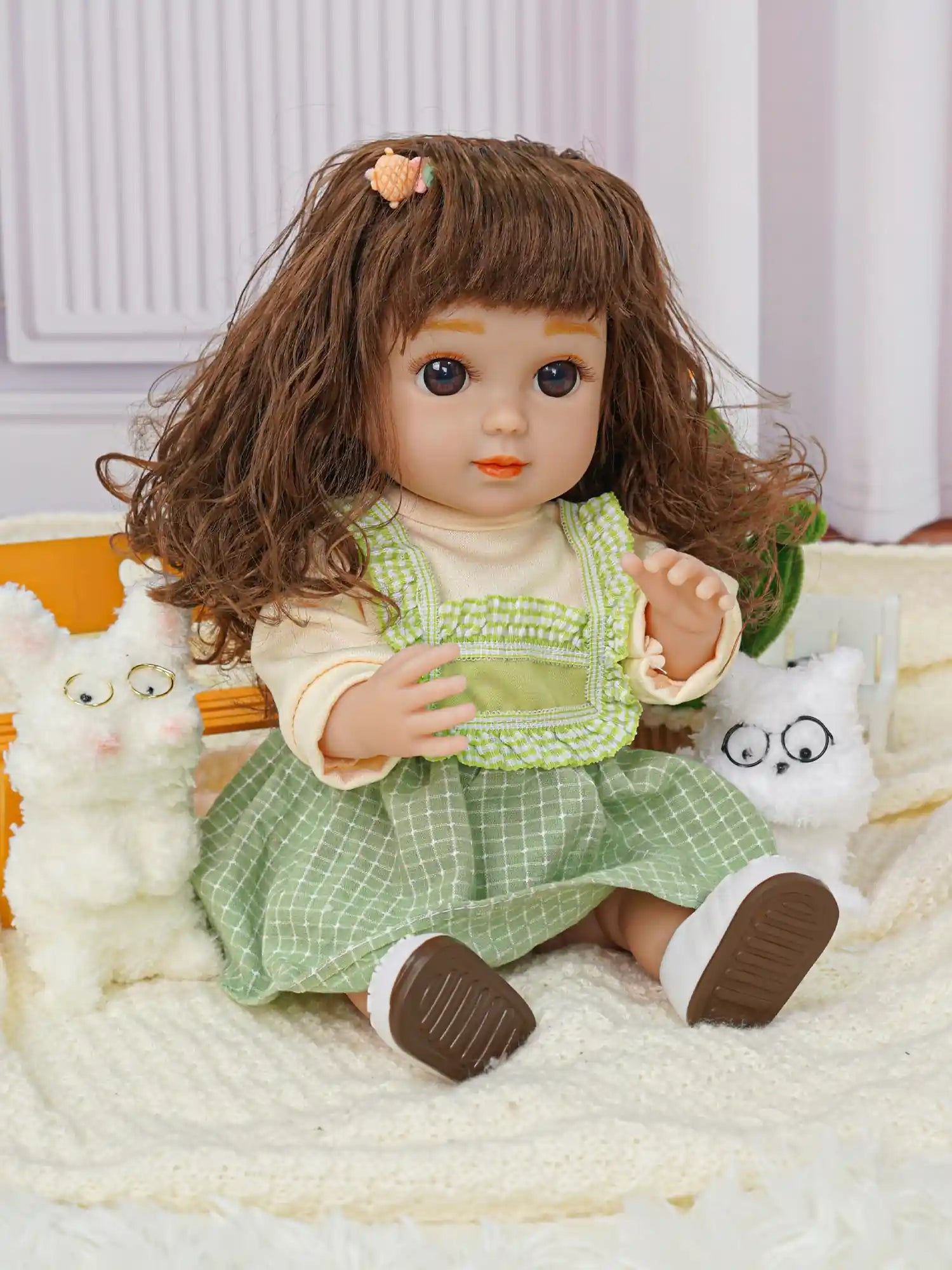 Doll with brown curls, in a checkered dress, accompanied by spectacled dog toys.
