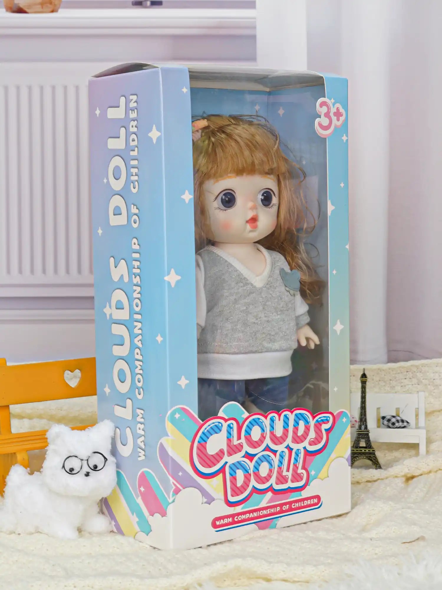 Adorable fashion doll with a side ponytail, complemented by a quirky white toy dog with gold-rimmed glasses.