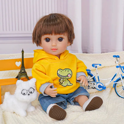 Doll with short brown hair in a yellow hoodie and denim shorts, with a plush dog and bicycle.