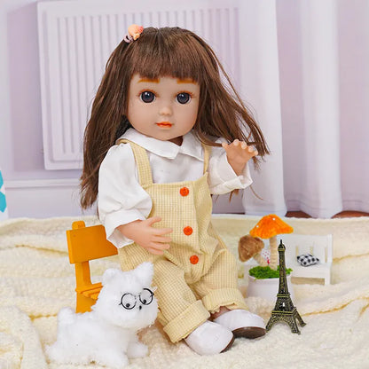 Doll with blue eyes, dressed in overalls, sitting by a toy dog and a metal tower.