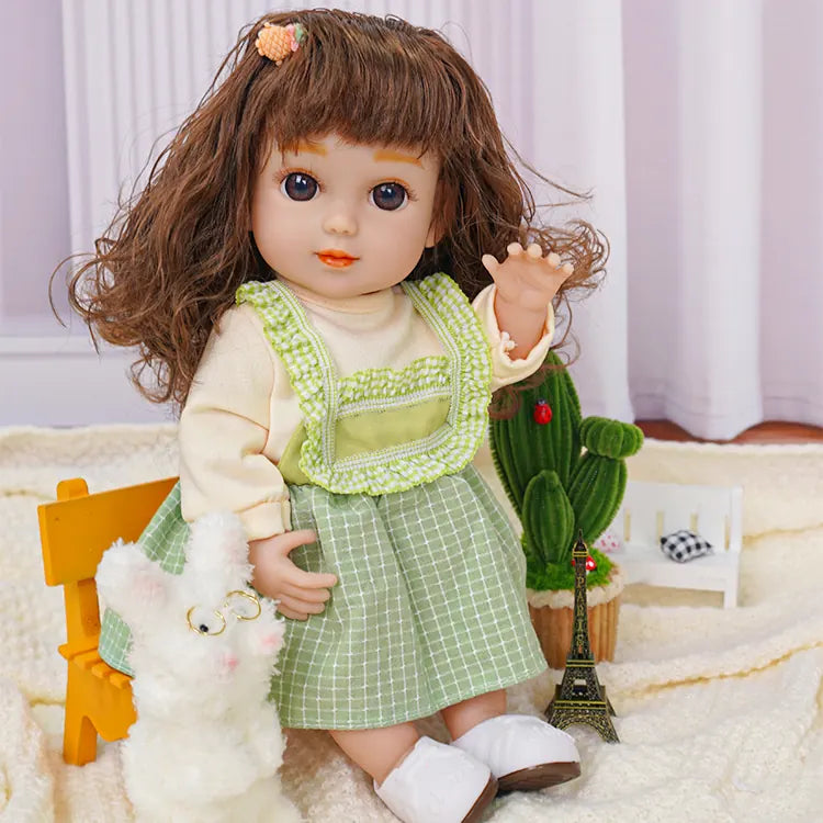 Doll waving in a layered outfit, with two fluffy dog toys and a green plant.