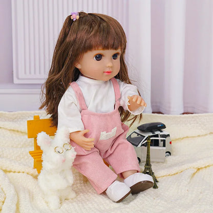 Waving doll with hair ties, next to a plush dog and miniature Parisian landmark.