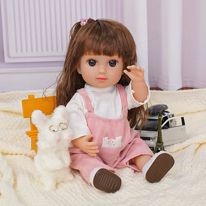 Doll seated on a chair with a white plush dog and toy Eiffel Tower.