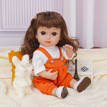  Childlike doll with brown curls, dressed in orange, with a stuffed dog and metal Eiffel Tower.