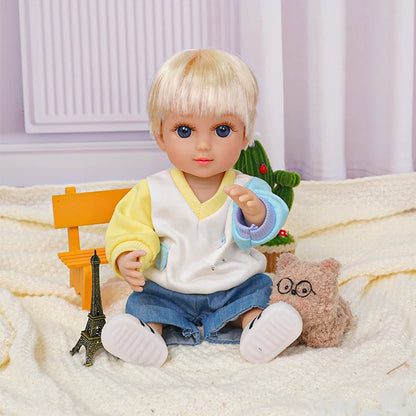 Adorable doll with striking blue eyes, sporting a casual modern look, with a knit toy companion.