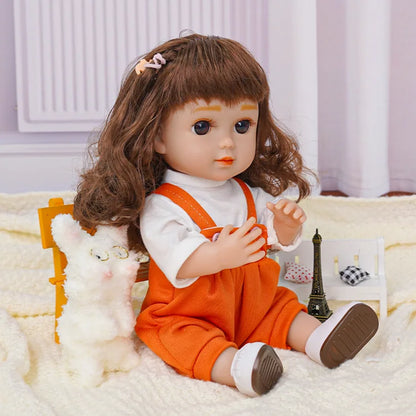 Doll with hair clip, orange dungarees, white dog toy, and Eiffel Tower model.