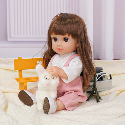 Doll with brunette ponytail, pink overalls, plush dog, and Eiffel Tower figurine.