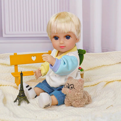 Charming blonde doll with a bob cut, dressed in a cozy sweater and shorts, with whimsical toys.