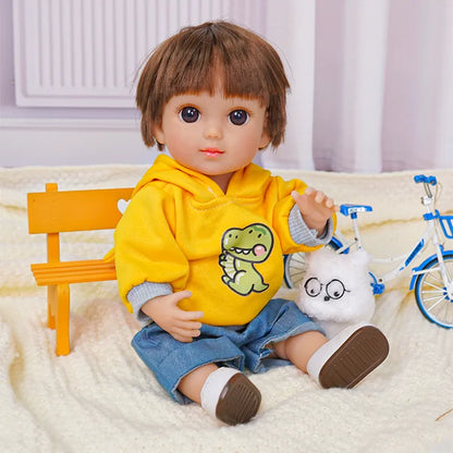 Doll in a vibrant outfit, sitting on a rug with a toy dog and a miniature bicycle nearby.