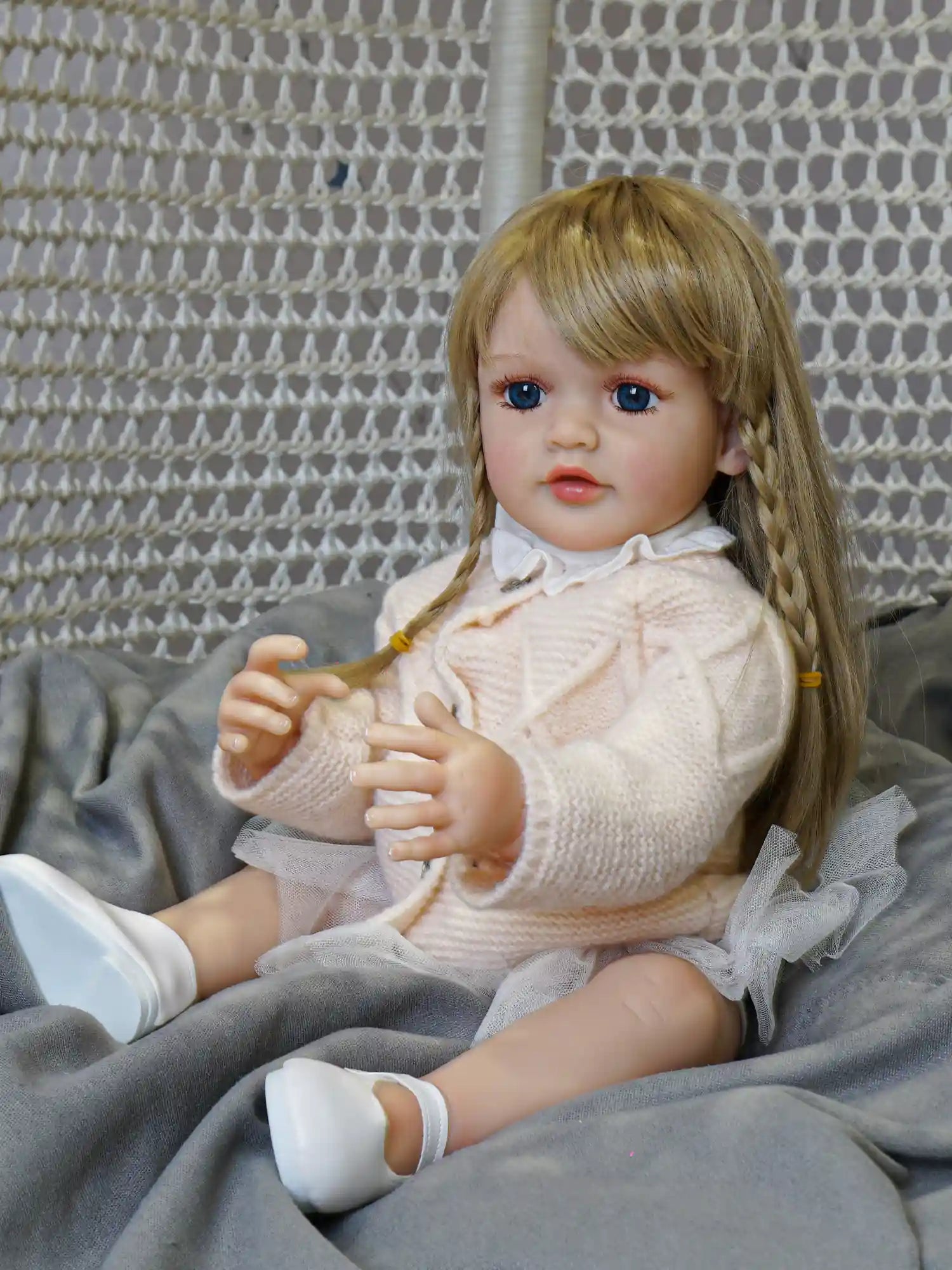 Adorable reborn baby dolls for sale, featuring realistic blue eyes