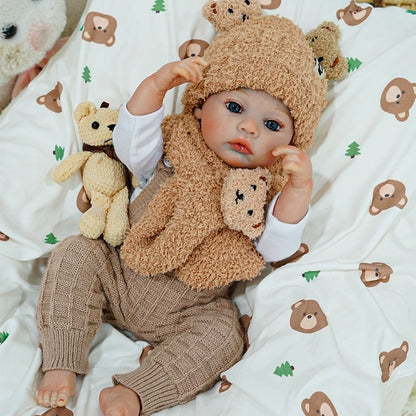 Reborn baby doll in a cute bear-themed outfit, adjusting the bear hat.