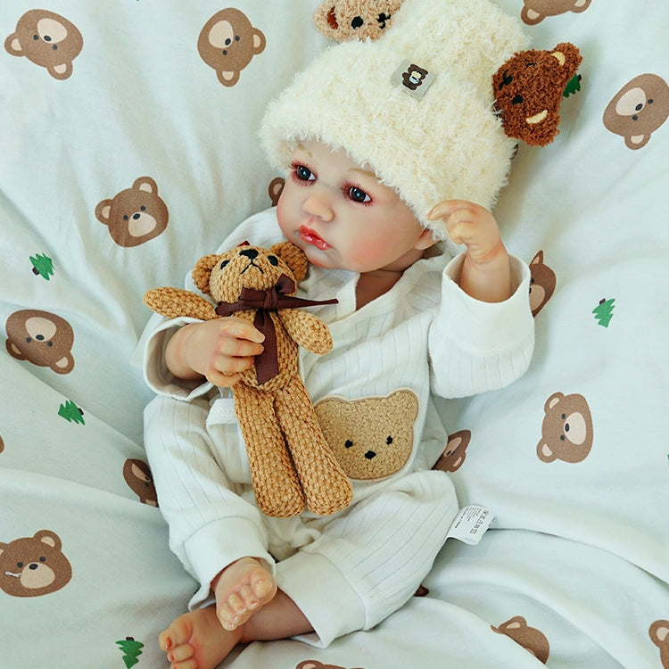 Doll in a playful pose, holding teddy bear and raising an arm.