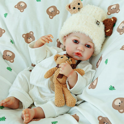 Doll holding the teddy bear, positioned with legs slightly outstretched.