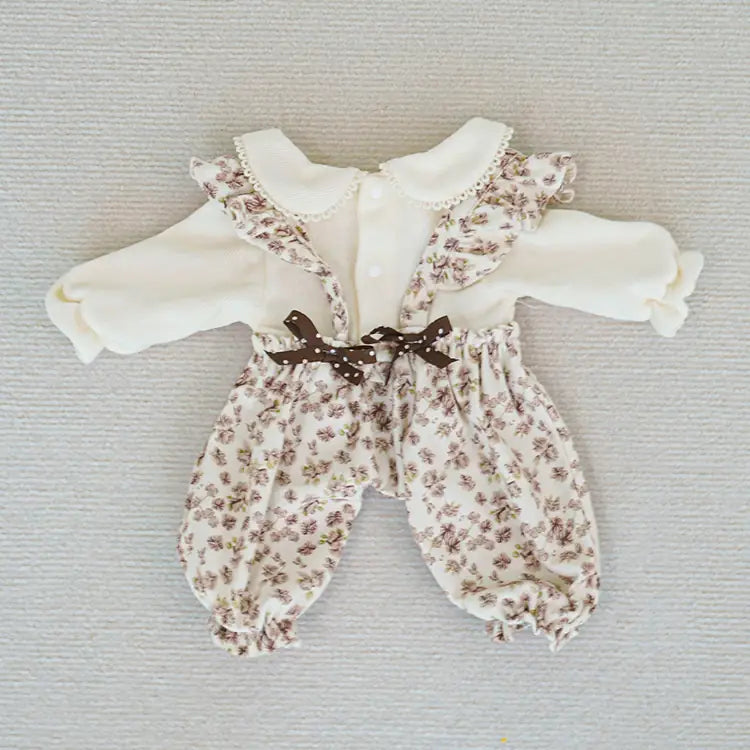 Floral onesie with bow and white sleeves for reborn doll
