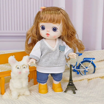 Fashion doll with a surprised expression, wearing casual clothes and yellow shoes, with a fuzzy companion.