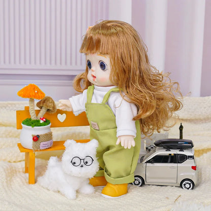 A toy doll with a tender expression, dressed in a casual outfit with a hair clip, stands by a plush kitten with glasses.