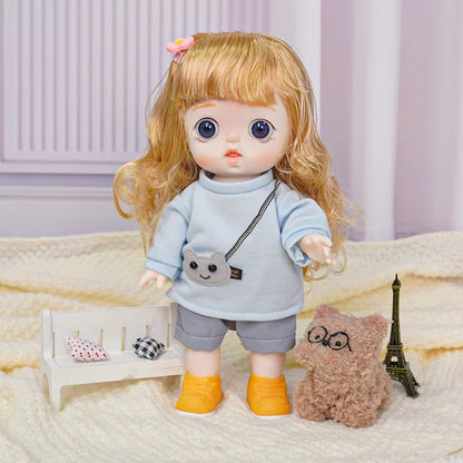 Curious-eyed doll with a cute outfit, featuring an animal pouch, next to a fuzzy toy with glasses in a modeled playroom.