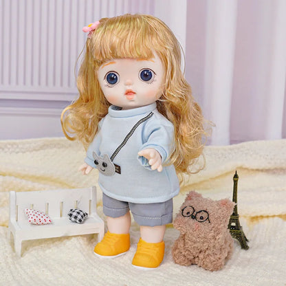 A playful doll with cheerful attire, including a crossbody animal bag, in a setup with a whimsical plush and toy décor.