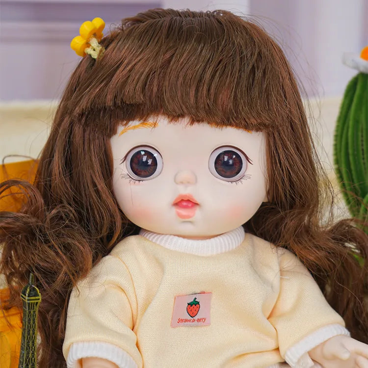 Endearing doll featuring a warm yellow top with a strawberry emblem, and a quirky plush friend, in a child's play scene.