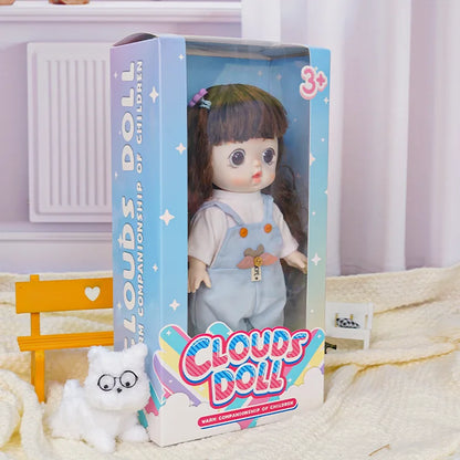  Playful doll with a purple hair clip, sporting a pastel blue jumpsuit with orange buttons, in a scene with Parisian flair.